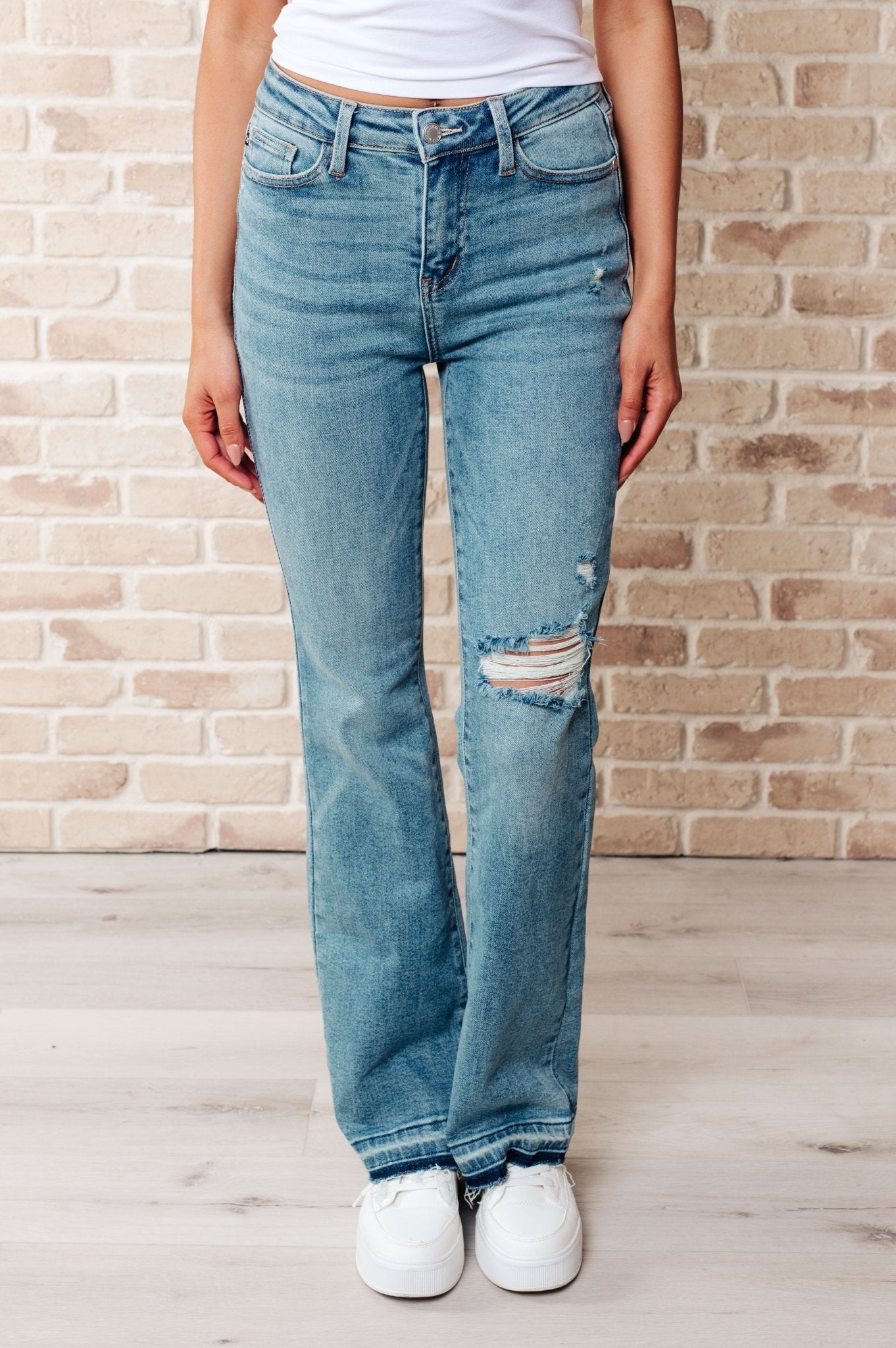Isla Mid Rise Distressed Released Hem Bootcut Jeans - Loving God