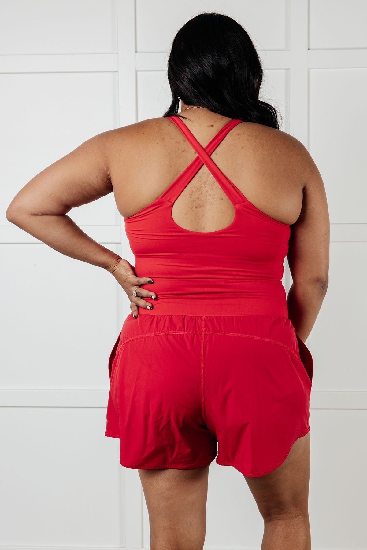 Raising Heart Rate Cutout Runsie In True Red - Loving God